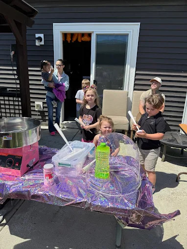 Large outdoor party setup with cotton candy